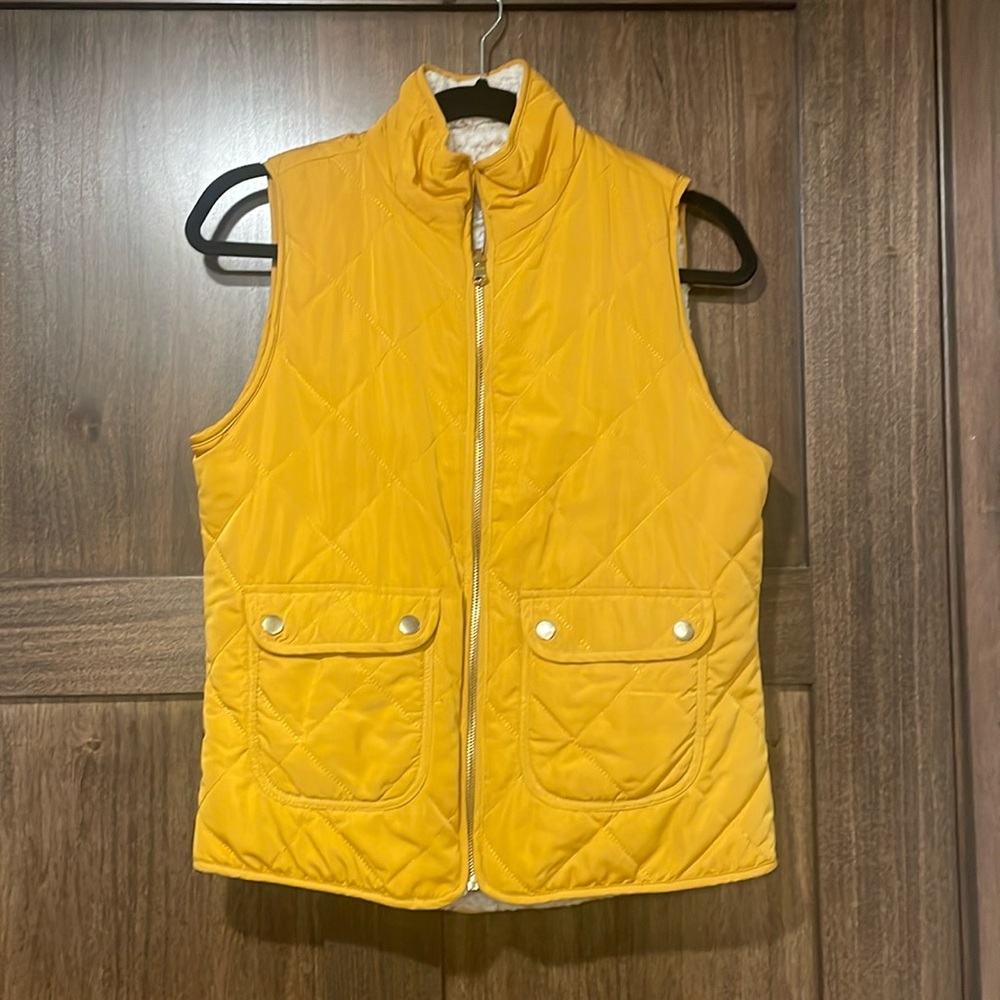 Quilted fleece lined vest.